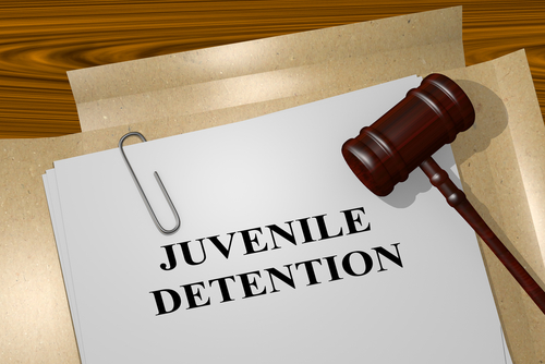 Juvenile detention fees dischargeable for mother